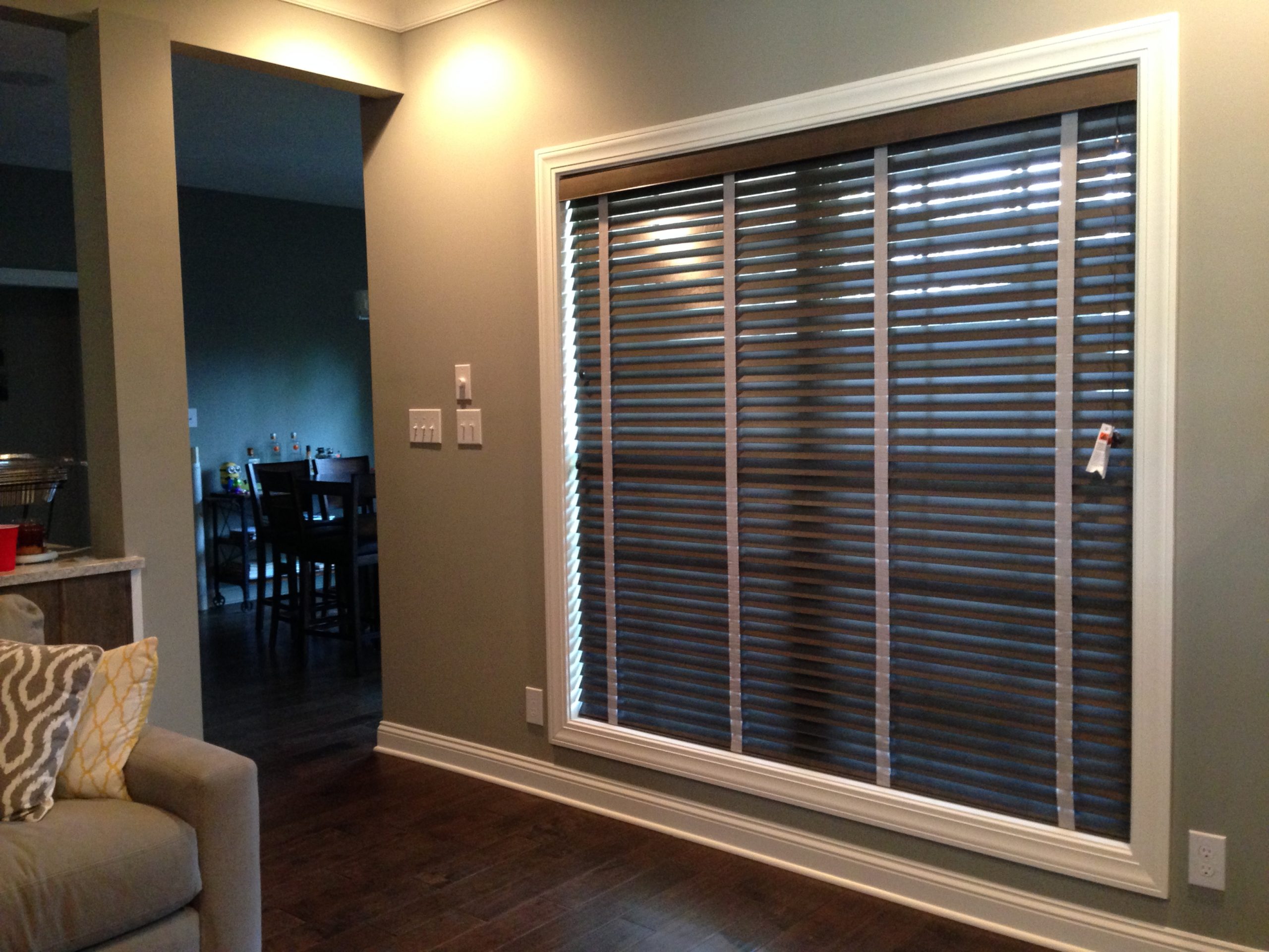 Wood blinds installed on a living room window